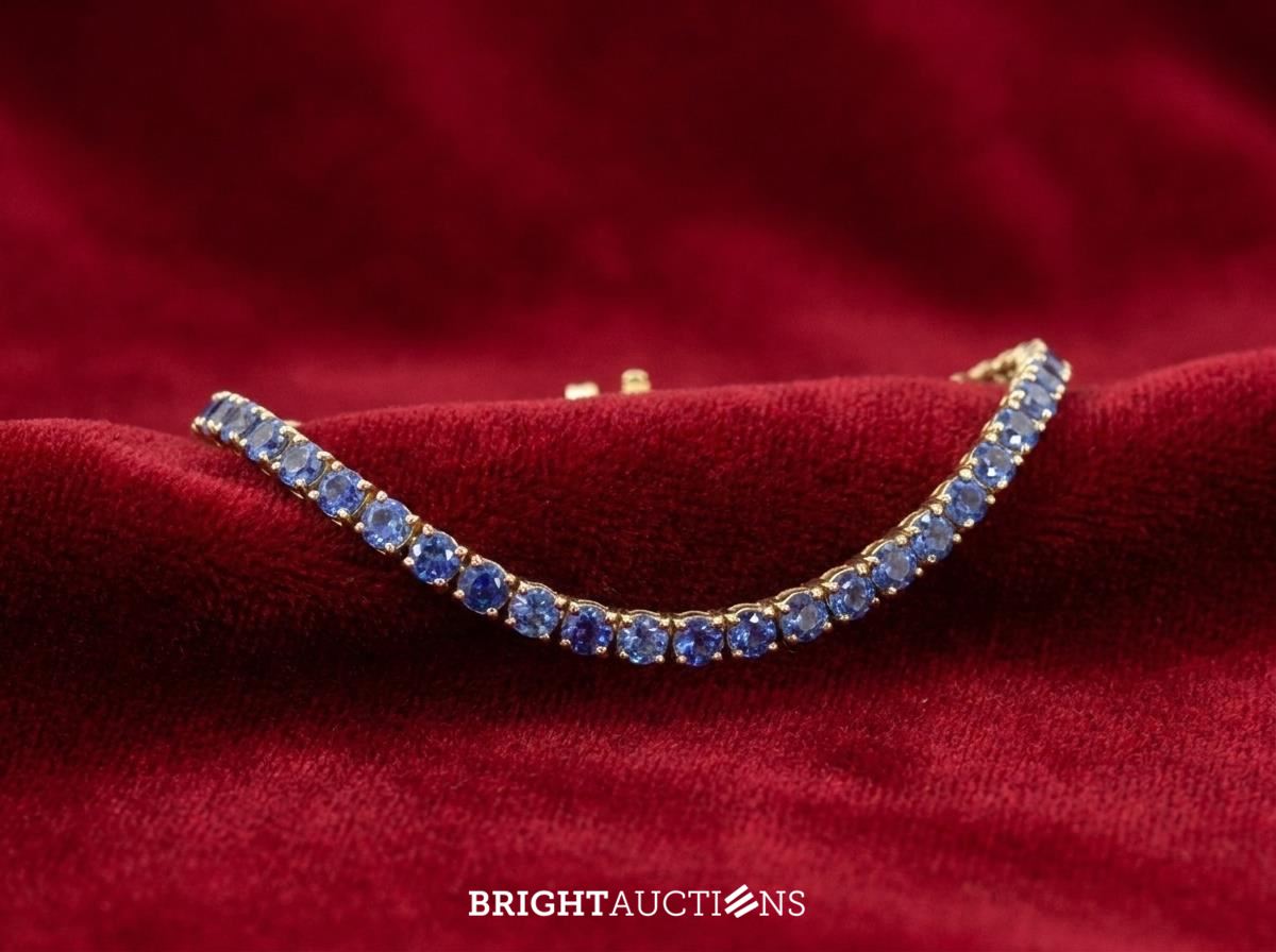Gouden tennisarmband met natuurlijke saffieren – kavel bij Bright Auctions, Netherlands