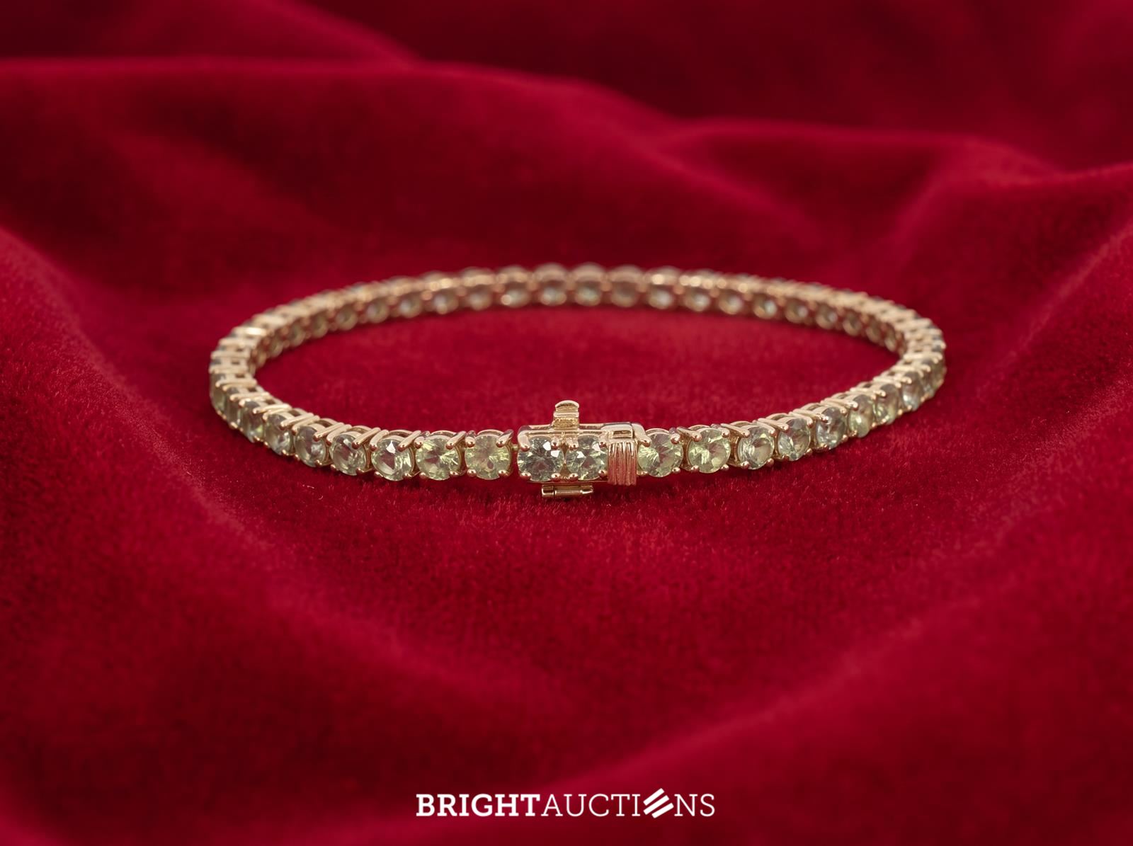 Gouden tennisarmband met natuurlijke saffieren – kavel bij Bright Auctions, Netherlands