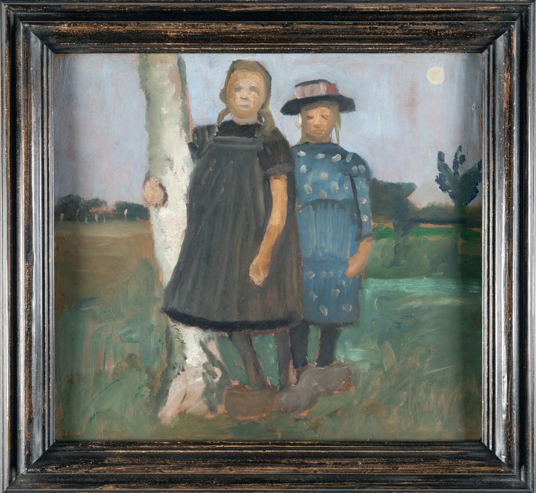 Two girls standing by a birch trunk
