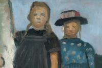 Two girls standing by a birch trunk