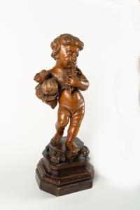 Zwei Putti, einer mit Seifenblasen und einer mit Füllhorn