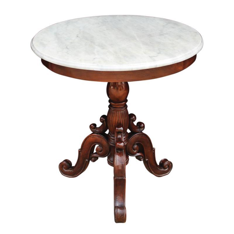 An Antique Round Marble Topped Table