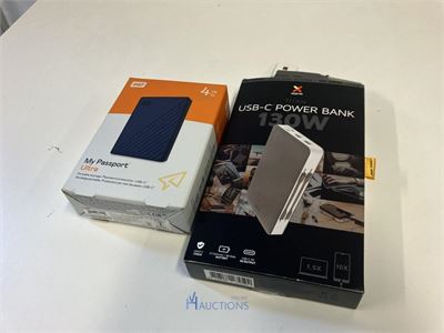 Powerbank TITAN en externe harde schijf WD – kavel bij VH Auctions