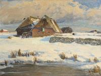 Reetgedeckte Häuser im Winter